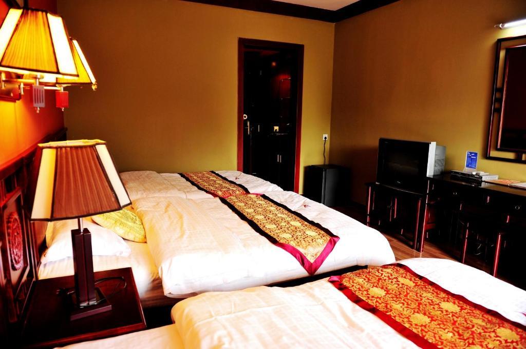 Hôtel Dragon River Retreat à Yangshuo Chambre photo